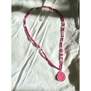 Hot pink beaded beach necklace with smiley face charm